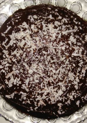 A picture of Vanilla cake with chocolate frosting.
