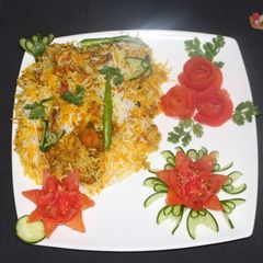 A picture of Tikka baryani with national tikka masla.