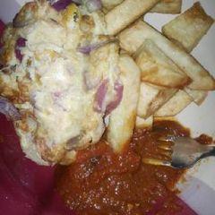 A picture of Fried yam with fried yam and sauce.