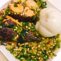 A picture of Okra soup and agidi.