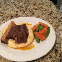 A picture of Beef Short Rib with Corn Whipped Potatoes.