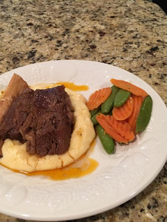 A picture of Beef Short Rib with Corn Whipped Potatoes.