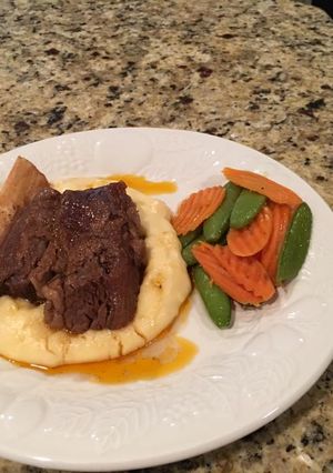 A picture of Beef Short Rib with Corn Whipped Potatoes.