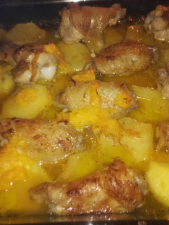 Una foto de Alitas de pollo a la naranja