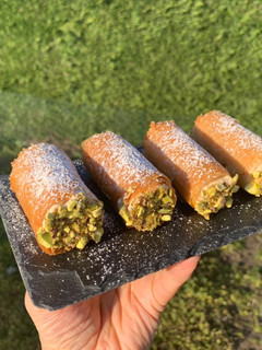 A picture of Phyllo Cannoli with Almond Cream.