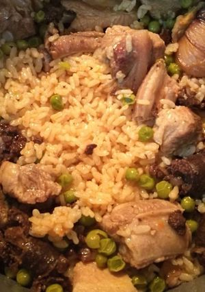 Foto principal de Arroz con costillas y panceta, morcilla, guisantes