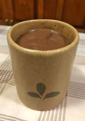 Una foto de Champurrado con maíz y chocolate mexicano 🌾