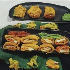 A picture of Arbi leaves Paneer pocket fritters.
