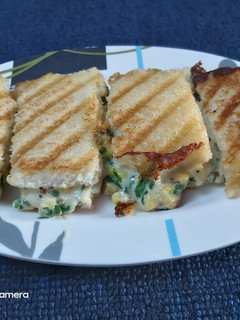 A picture of Grilled spinach and corn sandwich.