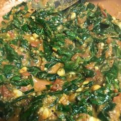 A picture of Tomato methi curry.
