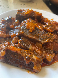 Una foto de Sangre con tomate