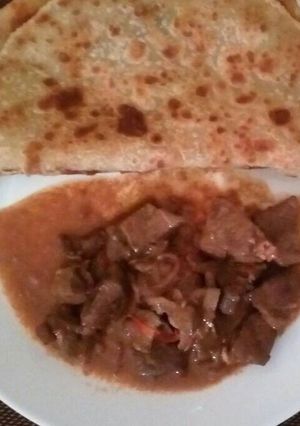 A picture of Stewed Liver with Chapati.