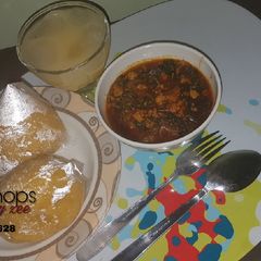 A picture of Eba and egusi soup.