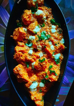 A picture of Butter Chicken in Restaurant Style.