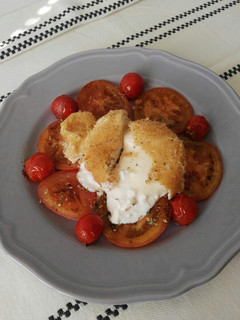 Una foto de Burrata empanada
