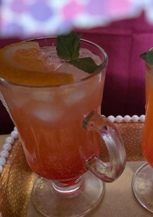 A picture of Red orange lime soda.