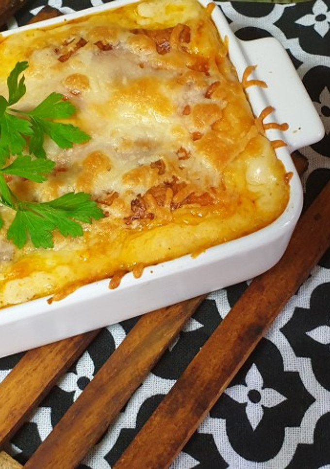 Una foto de Canelones a la española picantes