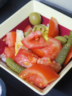 Una foto de Ensalada de tomate y cebolla