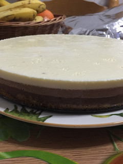 Una foto de Tarta tres chocolates