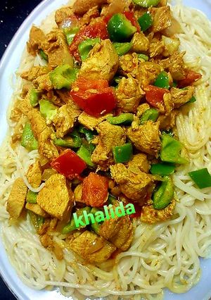 A picture of Chicken jalfrezi spaghetti pasta.