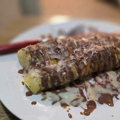 A picture of Fruit-stuffed crêpes.
