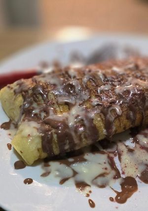 A picture of Fruit-stuffed crêpes.