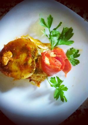 A picture of A ravioli stuffed with pumpkin and cheese.