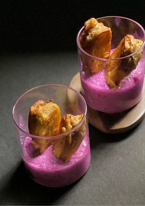 A picture of Thecha filled Aloo Pakora Chaat.