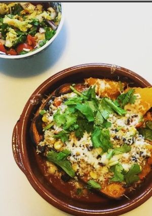 A picture of Black bean stuffed butternut squash.