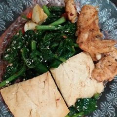 A picture of Stir fry kailan with tofu and chicken.