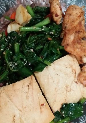 A picture of Stir fry kailan with tofu and chicken.