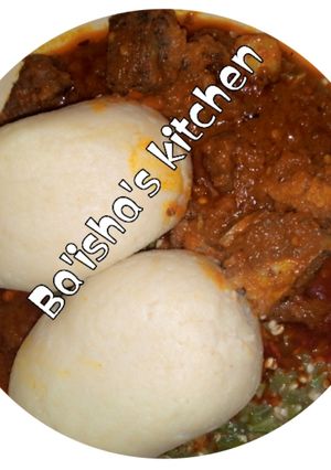 A picture of Moulded cous-cous with okro soup.