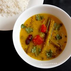 Moong Dal with Veggies- Bottle Gourd,Drumsticks,Carrot & Beans A picture of Moong Dal with Veggies- Bottle Gourd,Drumsticks,Carrot & Beans.