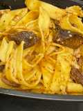 Crockpot stew meat over egg noodles