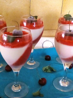 A picture of Vanilla Panacotta and Raspberry Jelly.