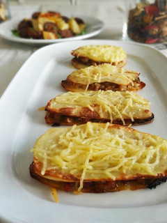 Una foto de Sandwiches de patatas horneados