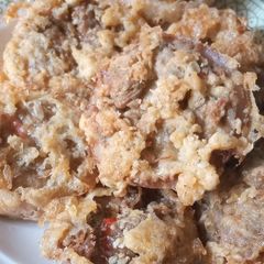 A picture of Beef mixed meat with onion.