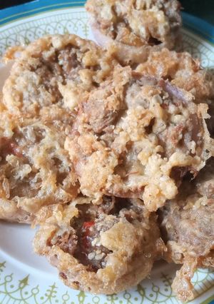 A picture of Beef mixed meat with onion.