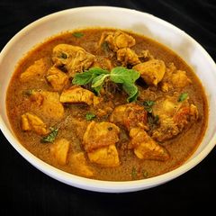 A picture of Butter Green Chicken.