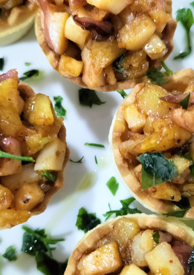 Una foto de Mini-tartaletas de patata y pulpo al pimentón