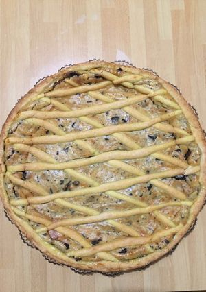 Una foto de Tarta de ricota, crema y chocolate