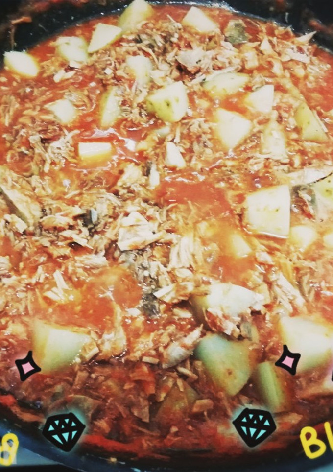 Una foto de Carnitas en salsa roja