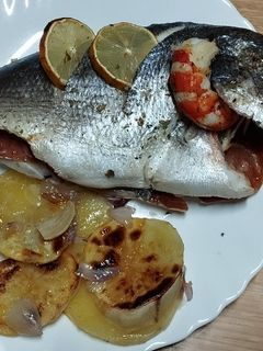 Una foto de Dorada rellena al horno