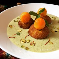 A picture of Mango Paniyaram in Kesar Pista Firni.