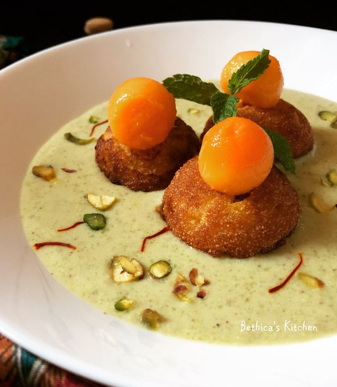 A picture of Mango Paniyaram in Kesar Pista Firni.