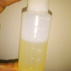 A picture of Home made Coconut oil using remains of coconut juice extract.