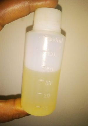 A picture of Home made Coconut oil using remains of coconut juice extract.
