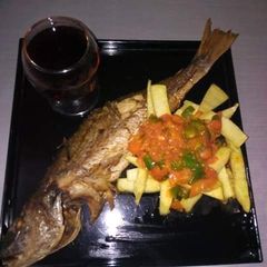 A picture of Home made roasted fish and potatoes sauce.