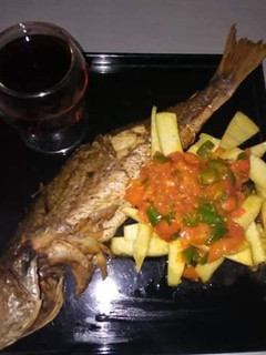 A picture of Home made roasted fish and potatoes sauce.