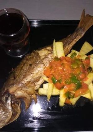 A picture of Home made roasted fish and potatoes sauce.